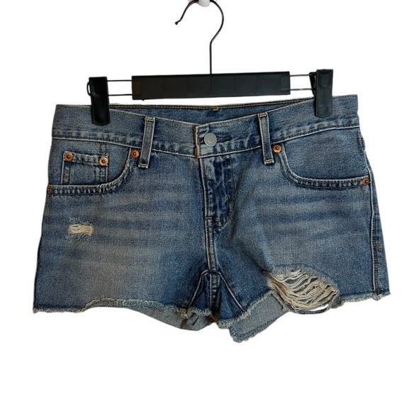 Levi’s Medium Wash Cut Off Distressed Denim Shorts - Picture 1 of 5